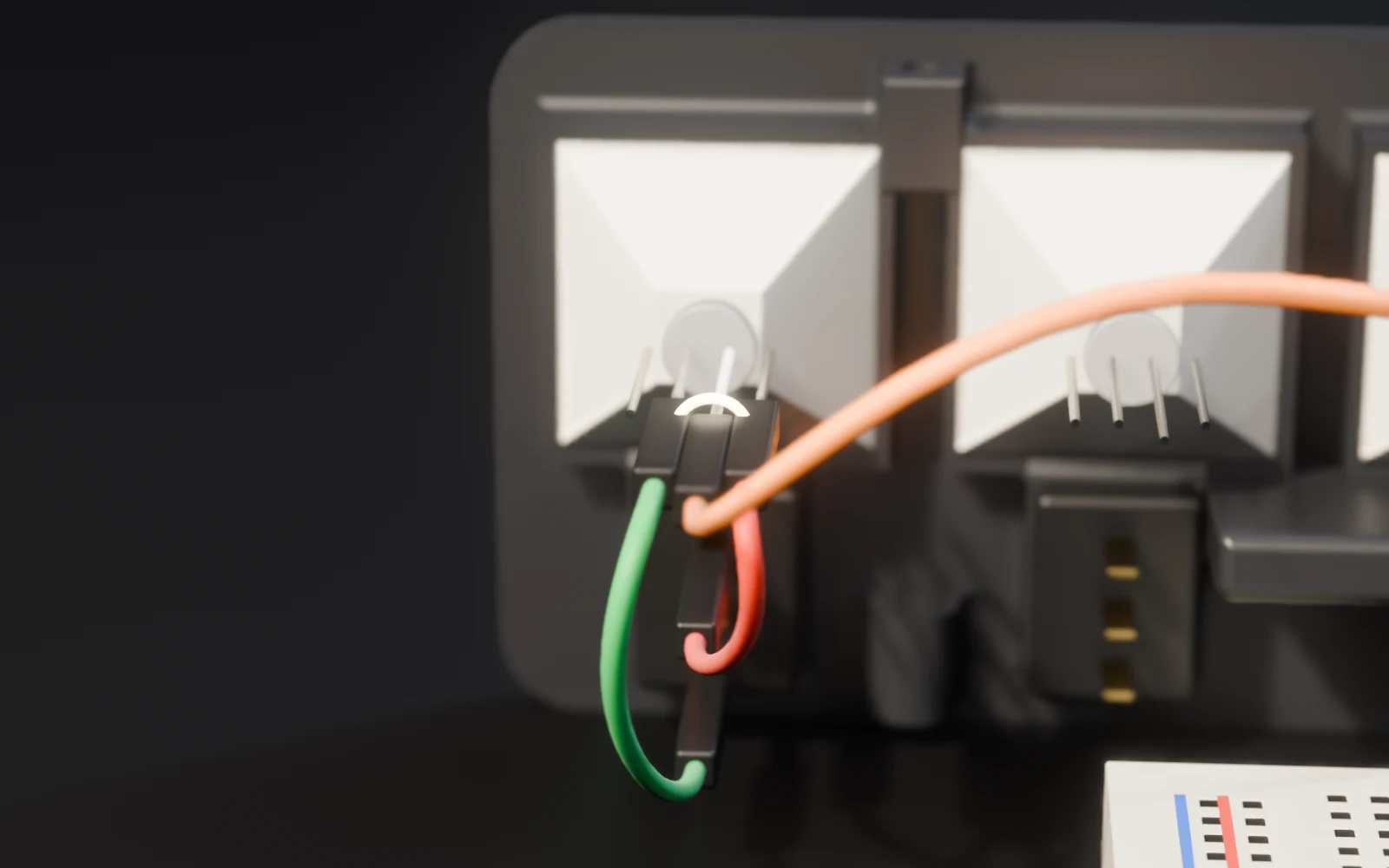 The LED from behind: four legs, the long one marked, three wires attached