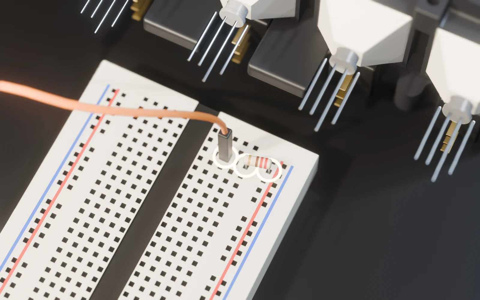 Top view of the first circuit: the resistor and the three holes it uses, marked